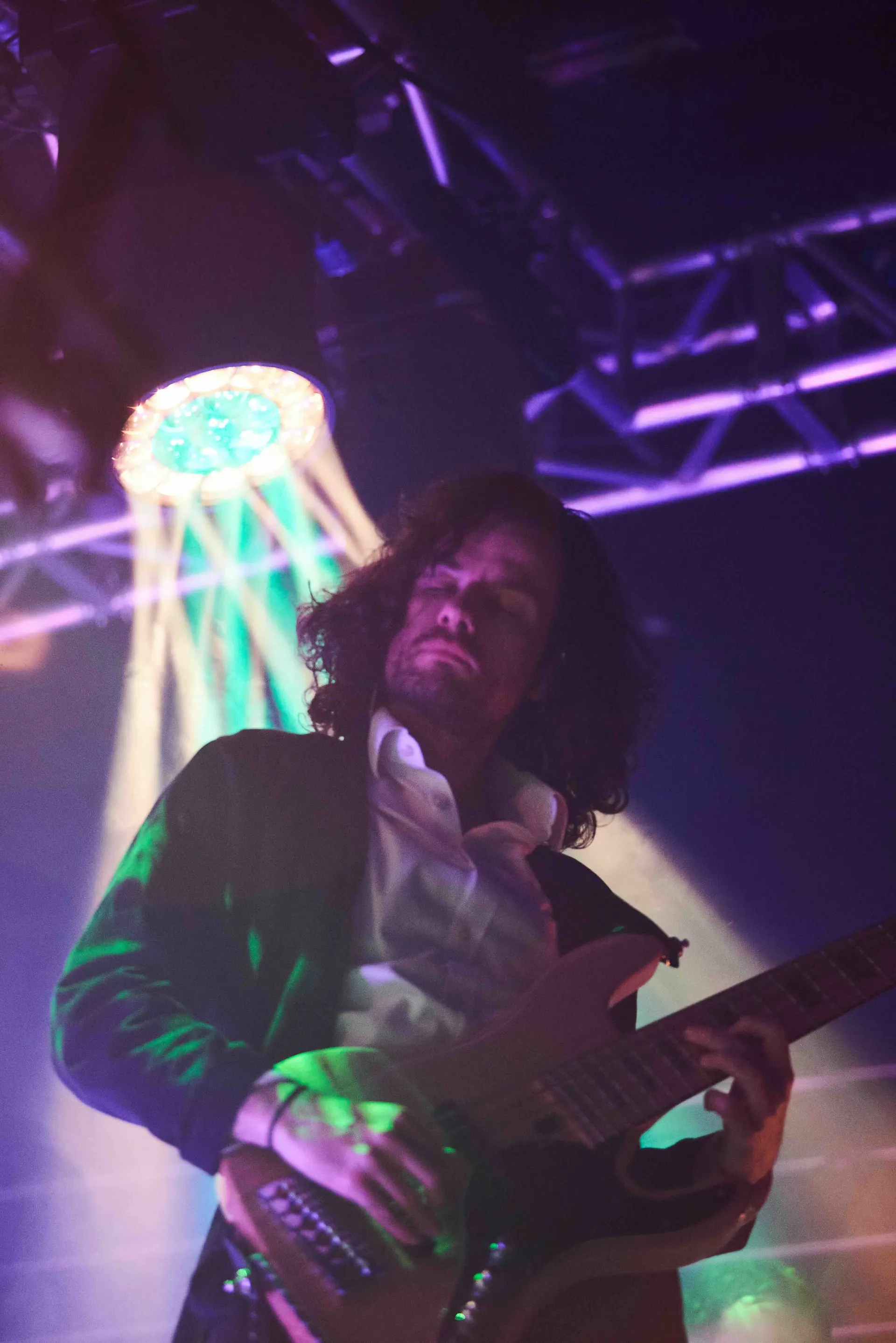Jack on stage under stage lights