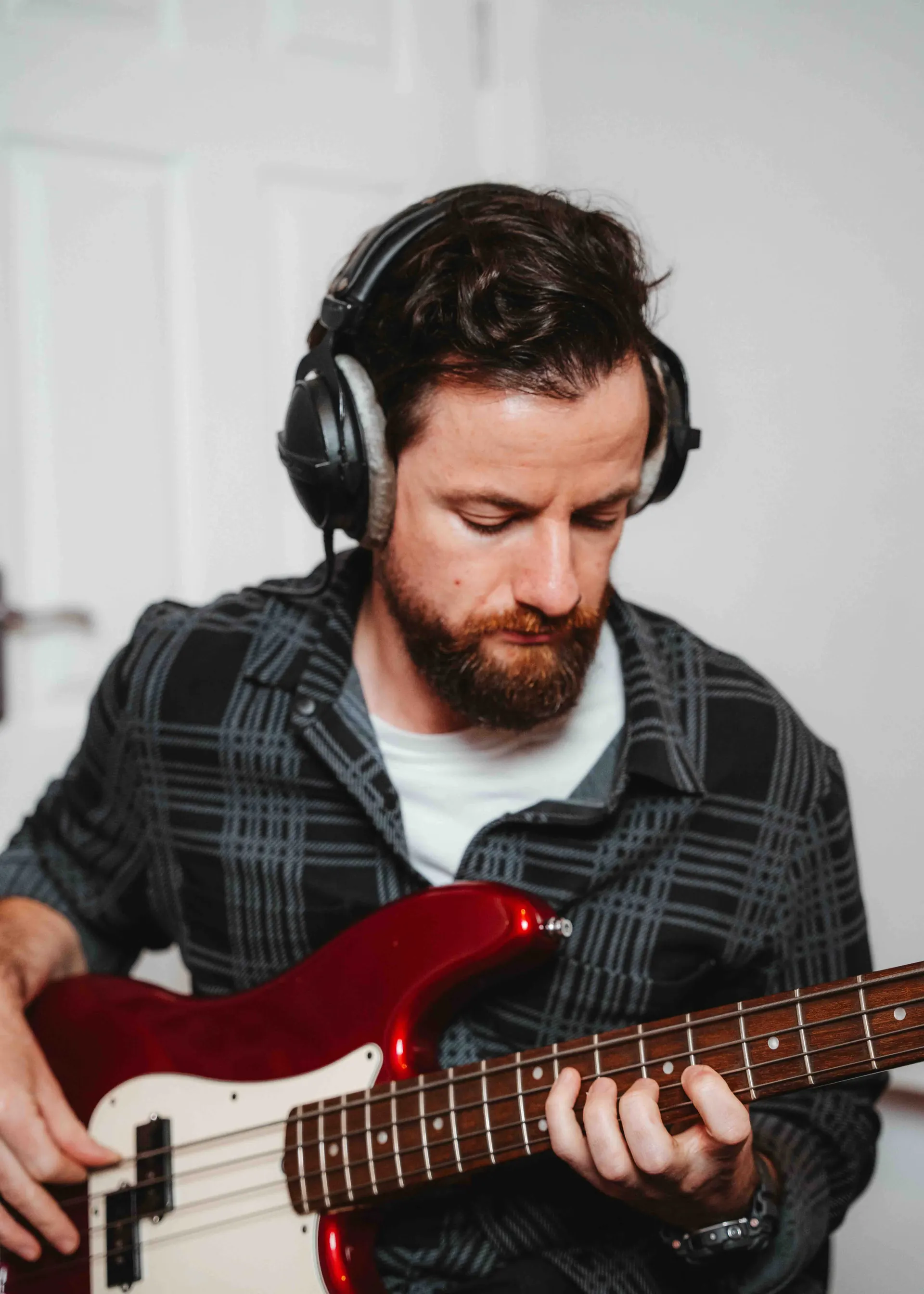 Jack recording bass with a Fender Precision in the studio
